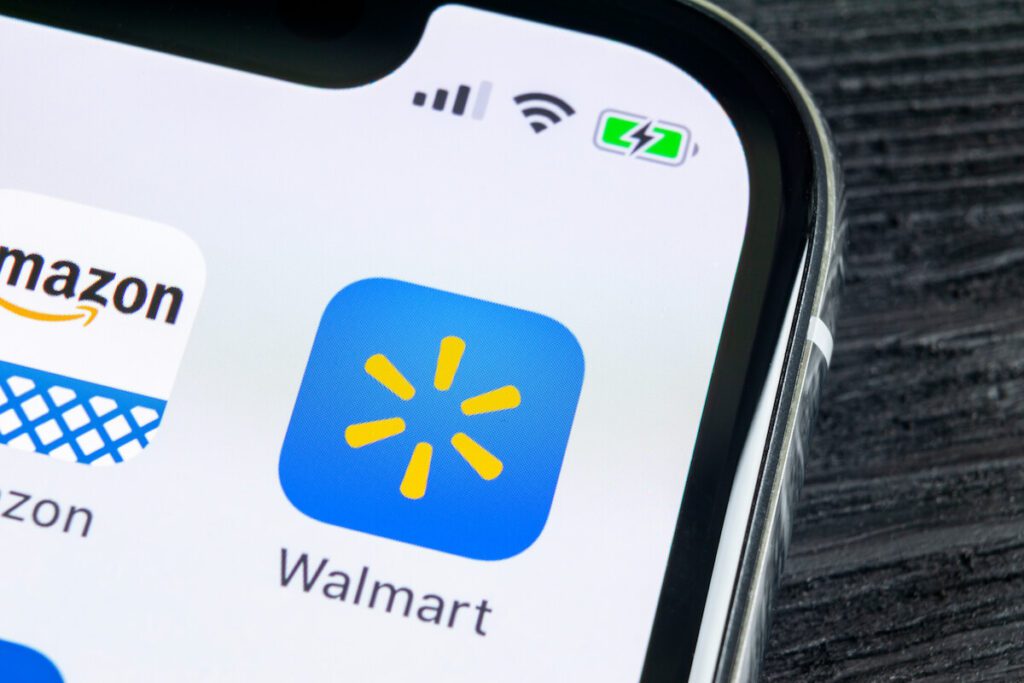 Walmart logo on phone with amazon